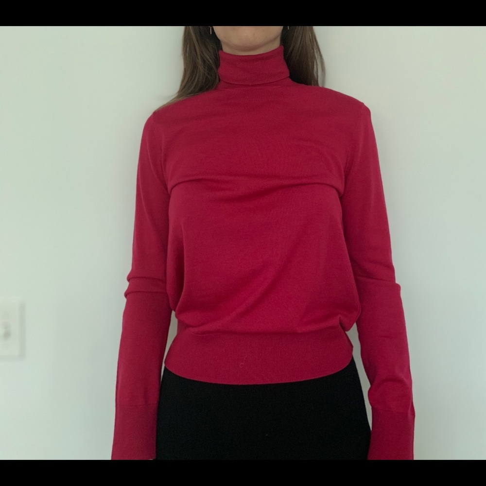 Pink turtleneck sweatershirt